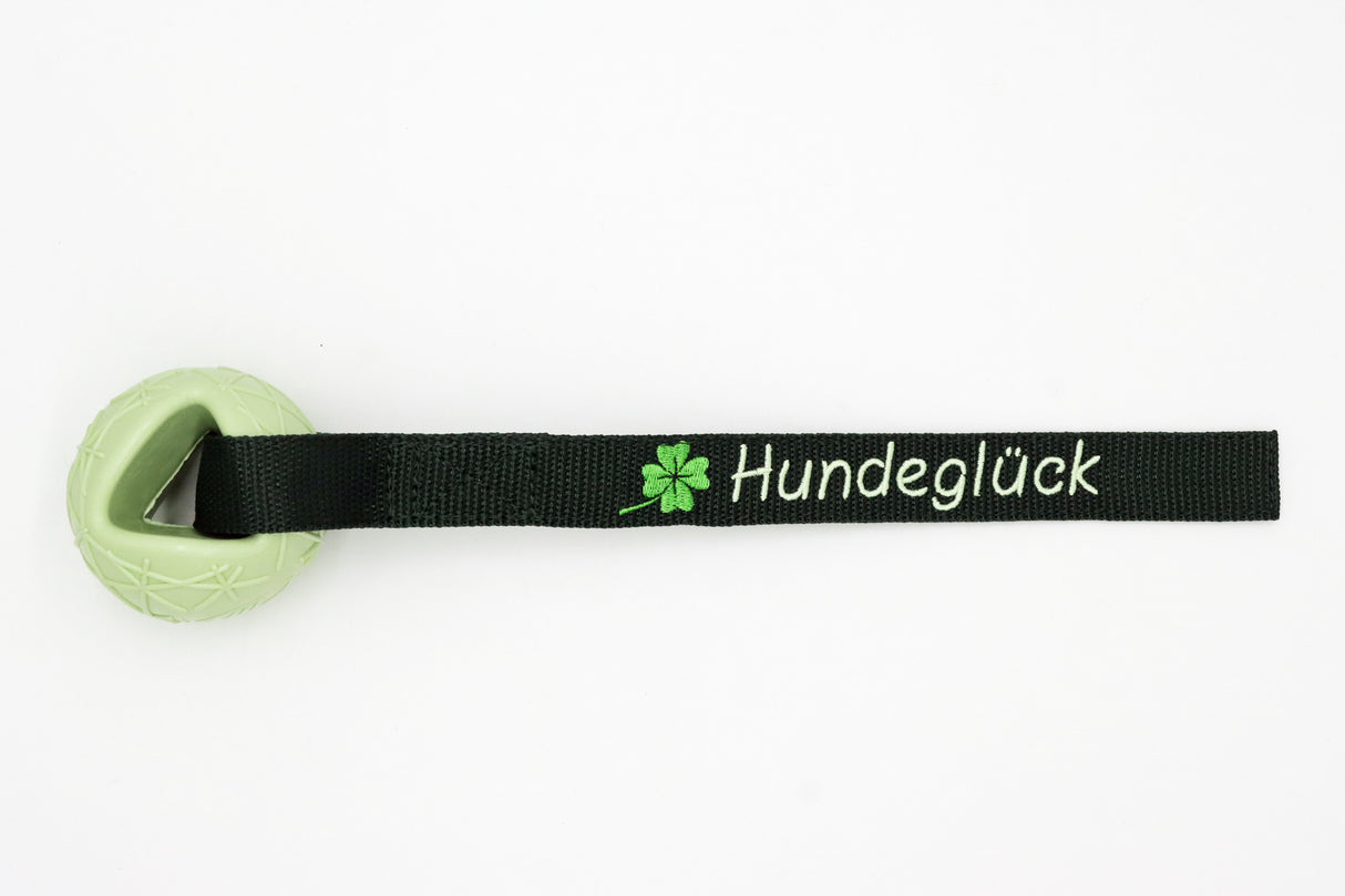 Hundeglück MOBY SOFTBAITS Ball 7 x 6 cm / Total Länge ca. 35 cm / Bandbreite 2.5 cm / Band